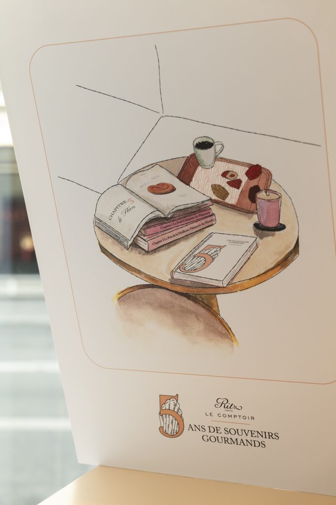 Signe graphique du chiffre 5 associé à une madeleine, identité visuelle d’anniversaire d’une pâtisserie de luxe